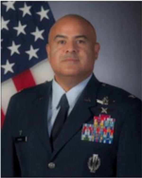 Col. Peter J. Flores, USAF, commander for Space Training and Readiness Delta (Provisional), STAR Delta (P), Peterson Air Force Base, Colorado, presents at chapter's December event.