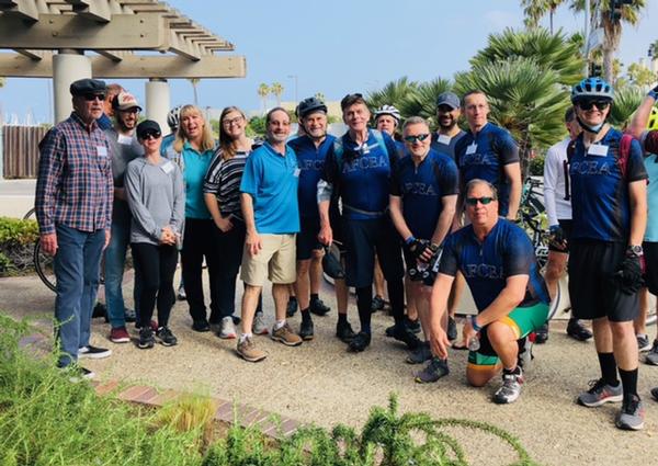 Riders and support staff prepare for the Cycling for STEM 32-mile ride in July. 