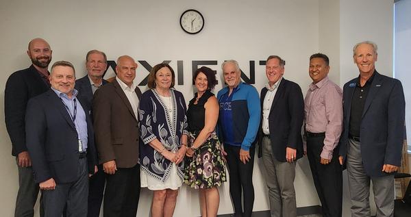 Lt. Gen. Susan Lawrence, USA (Ret.), president and CEO of AFCEA International (fifth from l), visits with chapter members in May.