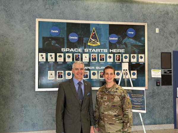 Col. Heather Bogstie, USSF, deputy director, Space Systems Integration Office, Space Systems Command, pauses for a photo with Todd Wiest, chapter director of programs, at the February event. 
