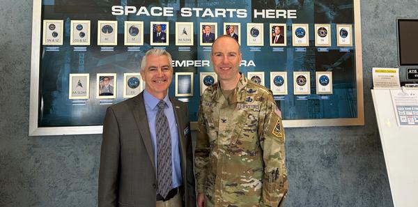 Col. Robert Davis, USAF, poses for a photo with Todd Wiest, chapter vice president of programs, at the May event.