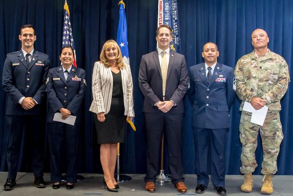 Pictured are (l-r) Capt. Brian Huntley; Staff Sgt. Veronica Cordova; White; Plantenga; Master Sgt. Dante Seward; and Lt. Col. Marin (accepting for Capt. Howard Shoa). Not pictured is Tech Sgt. Soni Rawtani.