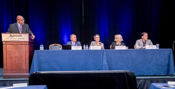 Panelists (from l-r) Will Strozier, SMC's Office of Small Business Programs; John Baldonado, SMC; Melanie Stricklan, Slingshot Aerospace; Julie Ann Phinney, ENSCO; and KC Newton, CEO, Omni Consulting, discuss small business concerns at the Space Industry Days in October.