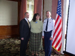 Following his speech at the March meeting, Col. Bernie Gruber, USAF (r), director, Global Positioning Systems Directorate, Space and Missile Systems Center, joins Tim Hammond, chapter vice president for publicity, and Patty Teschke, chapter vice president for operations.