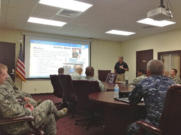In December, Warlick provides an AFCEA overview to Andersen Air Force Base's 36th Communications Squadron personnel.