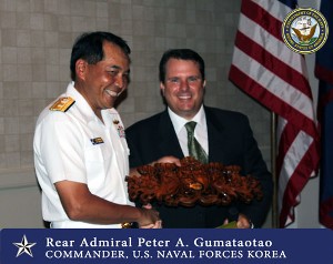 Lambert (r), chapter president, presents a token of appreciation to Adm. Gumataotao for his speech at the July luncheon.