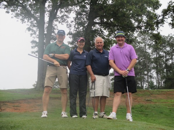 Attending the chapter's inaugural golf tournament in May are (l-r) Col. Dave Babyak, USAF (Ret.); Maj. Maria Gronning, USAF; Maj. Gen. John Maluda, USAF (Ret.); and Col. David Schilling, USAF. 