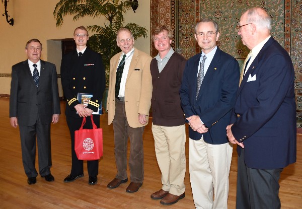 Naval Postgraduate School (NPS) President Vice Adm. Ronald Route, USN (Ret.); AFCEA awardee Lt. Andrew Moss, USN; NPS professor Herschel Loomis; NPS professor Frank Kragh; NPS Graduate School of Engineering Dean Phil Durkee; and Chapter President Lawrence Reeves meet in the Barbara McNitt Ballroom in December.