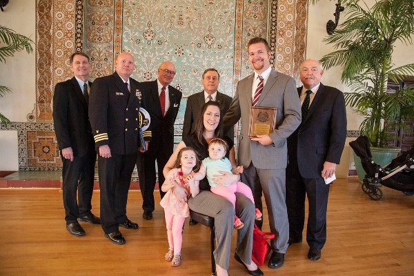 In March, chapter awardee Kubat (2nd from r) is joined by his wife Jennifer and his daughters Charlotte and Grace. Also present are (l-r) Dean Clyde Scandrett, Ph.D., School of Engineering and Applied Science, Naval Postgraduate School (NPS); Cmdr. Thor Martinsen, USN, Cyber Program military professor; Larry Reeves, chapter president; Vice Adm. Ronald Route, USN (Ret.), NPS president; and Provost Douglas Hensler, Ph.D., executive vice president, NPS.