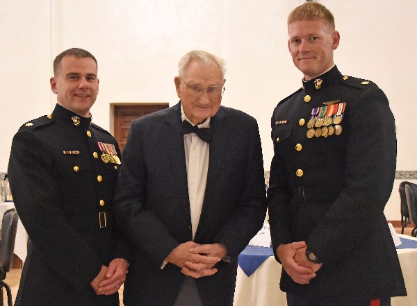 AFCEA Wozencraft award recipients Maj. Eric Larsen, USMC (l), and Maj. Foushee (r) accompany World War II veteran David Hendrickson, USCG, a speaker at the June event. 