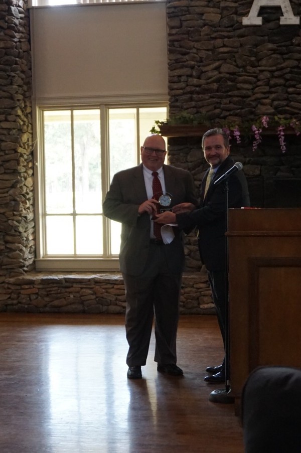Joseph Sifer, AFCEA International's chairman of the board, receives a token of the chapter's appreciation from Brian Knott, president, for speaking at the April luncheon.