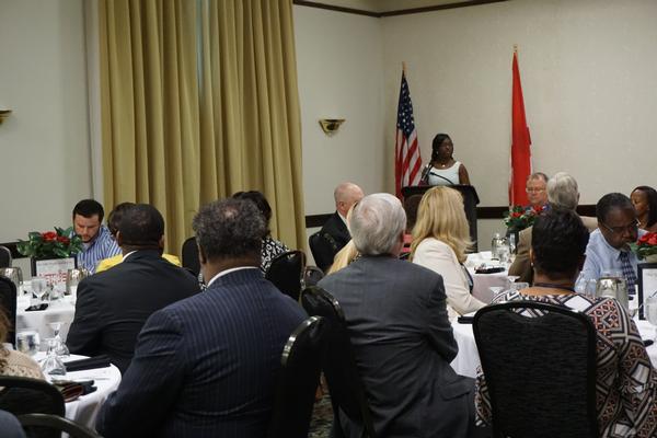 Charisse Stokes (front, c), the chapter's Education Foundation director, speaks at the Diversity in STEM Educators Forum in August.
