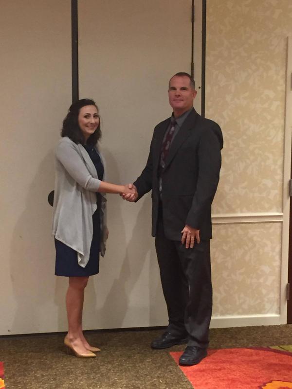 Tija Brown (l) thanks guest speaker William Walski, lead scrum master, Array Information Technology Inc., for his presentation at the Business Over Breakfast seminar in September. 