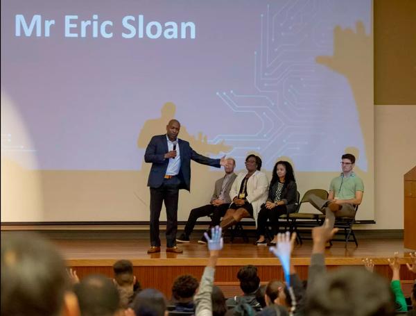 Eric Sloan, chapter education foundation director, addresses the students at CampIT in March.
