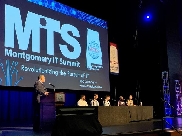 In May, Toy Robinson, Air Force Life Cycle Management Center(AFLCMC)/HI COE, moderates the Agile Software Factory panel with panelists (l-r) Master Sgt. James Crocker, USAF, AFLCMC/HIT, BESPIN; Maj. Maximilian "Max" Reele, USAF, AFLCMC/HIA, BESPIN; Maj. David Rothzeid, USAF, AFLCMC/HNJ, DIUx; Derek Tracy, federal chief technical officer, Pivotal; and Delali Dzirasa, CEO, Fearless Solutions.