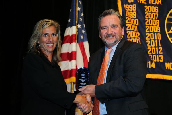 Cynthia Crews, Air Force Life Cycle Management Center (l), receives the Government AFCEAN of the Year Award from Knott at the August banquet.