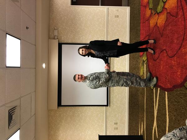 Young AFCEAN Tija Brown presents Maj. Kevin Deibler, USAF, commander, 689th Network Operations Squadron, a token of appreciation for speaking at the chapter's January breakfast.