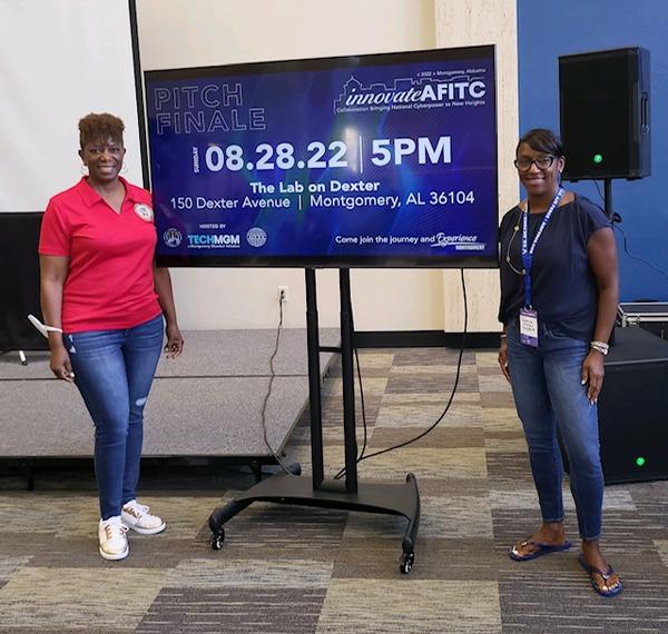 Kyna McCall-Paster, chapter president (l), and Charisse Stokes, Mid-South regional vice president and director of TechMGM, attend 2022 Innovate AFITC in August.