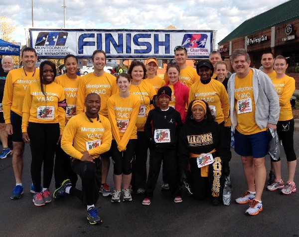 Members of Team YAAC smile before heading off into the Turkey Burner 5K in November.