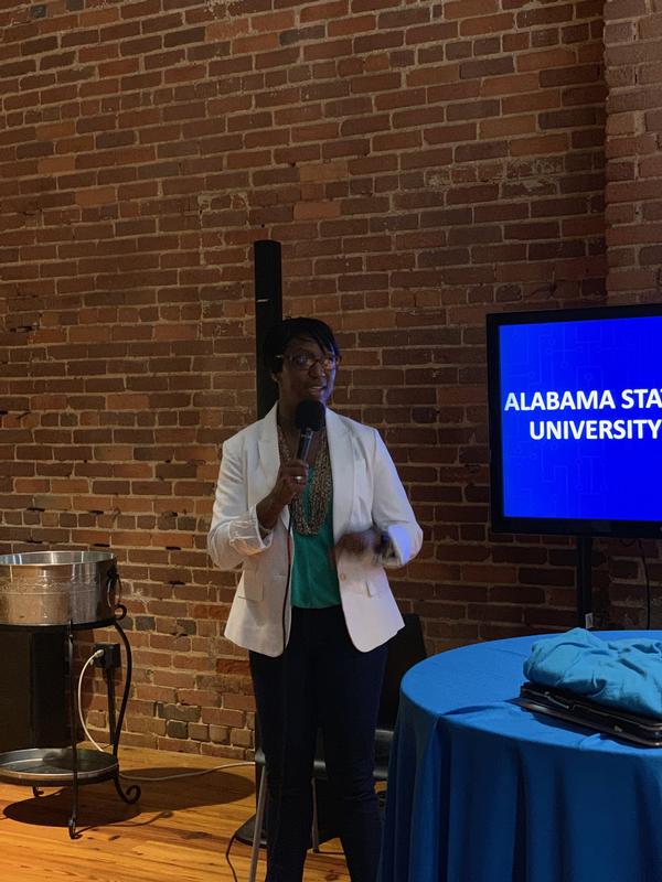 Charisse Stokes, regional vice president, Southeast Region, announces the winners of the August competition.