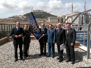 Gathering at March meeting are (l-r) Lucio della Valle, president of the ICT section of Unione degli Industriali; Massimo Canestro, chapter member; Capasso; Col. Giordano; Cdr. Howell; and Francesco Castagna, chapter member.
