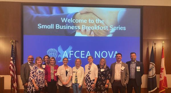 The AFCEA NOVA Small Business Committee joins Lt. Gen. VeraLinn "Dash" Jamieson, USAF (Ret.) (sixth from l), for a photo at the August breakfast.
