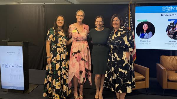 Jennifer Ellison, program manager, FAA Contract Tower Program, and Stephanie Perlick, chief operating officer, Evans Inc., and moderator Ellesse Krall, principal, Evans Inc., pose for a photo at the June event. 