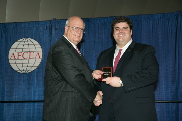 In February, Luke Howe (r) of Sagent Partners received a Distinguished Young AFCEAN Award from Kent R. Schneider, president and chief executive officer, AFCEA International. 