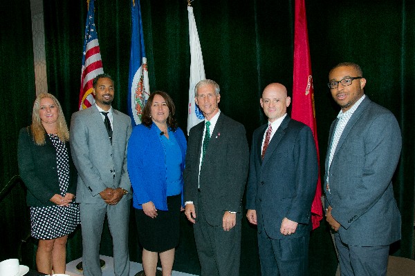 Attending the luncheon in September are (l-r) chapter members Diane Holland and Jovan Silva; guest speaker Anette Redmond, director, Army Intelligence Community Information Management; Chapter President Dave Scarbalis; and chapter members Mark Jasen and Justin Davis. 