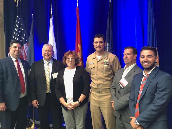Jeffrey Schneider, U.S. Defense Department Office of People Analytics, Defense Human Resources Activity (r), moderator of the chapter's September panel on artificial intelligence and machine learning, gathers with fellow panelists.