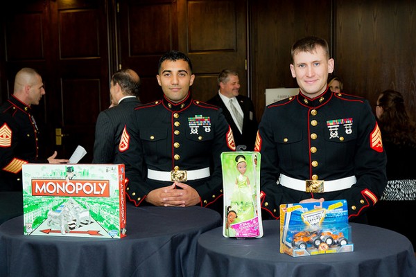 Marines collect for Toys for Tots at the chapter's November luncheon.