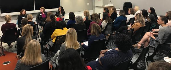 At the April event, attendees listen to a discussion on taking risks, seizing opportunity and celebrating small wins. 
