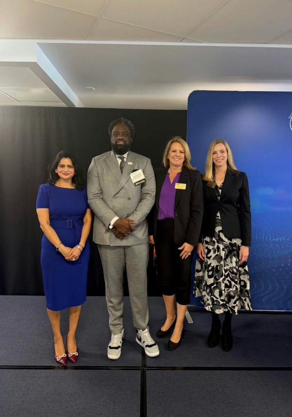 Chawla, Roberts, Tamara Greenspan, chair of the board of directors for AFCEA International and chapter past president, and Kelly Wenner, chapter president, pose for a photo at the May event. 