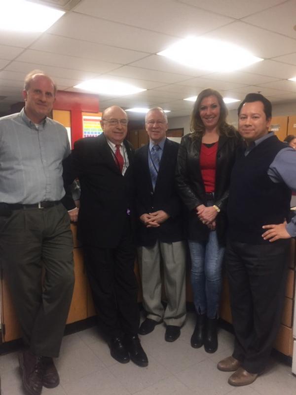 Chapter members (l-r) Gerry Lebel, Bob Landry, Ted Spar, Linda Drake and Paul-Michael Ferguson assist in judging science fair projects at Herndon High School, in February. 