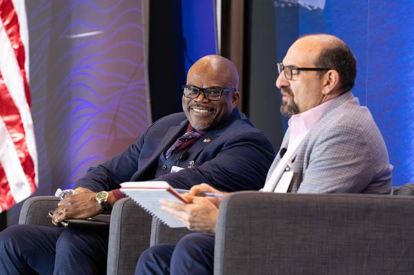 The March event's lunch and Fireside Chat feature Colin Crosby, deputy commandant for Information, service data officer, U.S. Marine Corps (l), and moderator, Jason Miller, executive editor, Federal News Network.