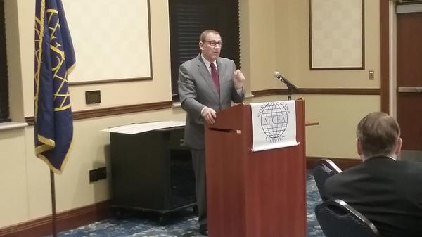 Lt. Gen. Michael Basla, USAF (Ret.), former Air Force chief information officer (CIO), speaks at the June chapter luncheon.