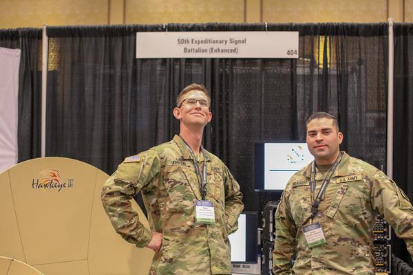 Soldiers from the 50th Expeditionary Signal Battalion booth show off their units' capabilities during TechNet Fort Bragg in March at the Iron Mike Conference Center, Fort Bragg, North Carolina.