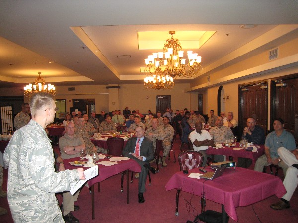Lt. Col. Adam Little, USAF, addresses chapter members during the April general meeting and luncheon.