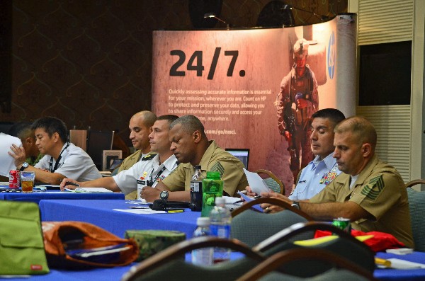 Panelists at the chapter's inaugural TechNet event in September are (l-r) Sgt. Maj. Hisato Uchikawa, JGSDF, Fleet Air Wing 5; Command Master Chief Petty Officer Satoshi Obata, JMSDF; Master Gunnery Sgt. Tommi T. Hanks, USMC, communications chief, Marine Forces Pacific; Master Sgt. Beau Broussard, USA, S-3 Operations, 58th Signal Battalion; Master Gunnery Sgt. Mathis Richard, USMC, communications chief of the Marine Corps; Chief Master Sgt. Richard Vargas, USAF, chief operations, 18th Communications Squadron; and Master Gunnery Sgt. Tim Lepsch, USMC, ground communications-electronics maintenance chief, III Marine Expeditionary Force.