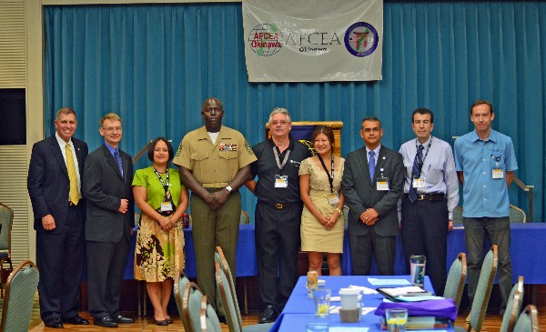 Gathering at the September TechNet event are (l-r) Col. Mike Warlick, USMC (Ret.), vice president for regional and chapter outreach, AFCEA International; Lt. Col. Adam Little, USAF; Maj. Angela Johnson, USA; Master Gunnery Sgt. Arthur Allen, USMC; Mike Davies, American Engineering Corp.; Mami Saito, American Engineering Corp.; Master Sgt. Jose Paloschavez, USMC; Mike Hoskelis; and Mr. Gordon Bolton.