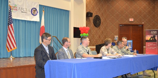 The Joint Information Environment discussion panel held during the October TechNet Day featured (l-r) Vincent Lee, senior systems engineer, Symantec Corporation; Bruce Hidaka-Gordon, information technology chief, Department of Defense Education Activity Pacific; Lt. Col. George E. Noel, USAF, commander, Defense Information Systems Agency-Pacific Okinawa Field Office; panel moderator Col. Loretta L. Vandenberg, USMC, assistant chief of staff G-6, III Marine Expeditionary Force; Maj. Mark M. Landez, USAF, director of operations, 18th Communications Squadron; and Maj. David K. Southerland, USA, S-3 operations officer-in-charge, 78th Signal Battalion, 516th Signal Brigade.