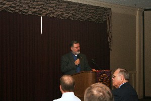 Marshall Guillory, program manager, Consulting Services Incorporated (CSI), and chapter executive vice president, welcomes attendees to the March meeting.
