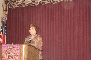 Renee Taylor, chief, plans and programs branch, Communications Directorate, Tinker AFB, and chapter vice president for special projects, talks about the annual awards program during the January meeting.