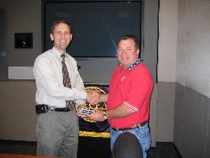 Roger Smith (l), incoming chapter president, congratulates Jerry Stahl for his past service as chapter president.
