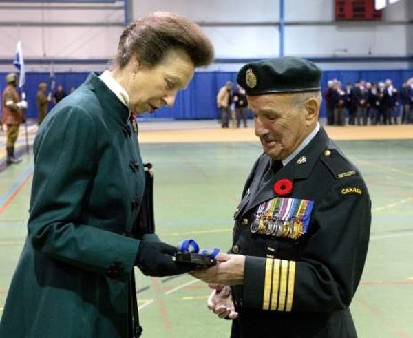 Her Royal Highness, The Princess Royal, Princess Anne, colonel-in-chief of the Communications and Electronics (C&E) Branch, presents the Colonel-in-Chief Commendation, serial number 3, to Honorary Col. David Hart, who at 96 is the oldest serving member in the Canadian Armed Forces.
