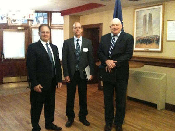 Speakers at the October luncheon are Dr. Paul Hubbard (c) and Dr. Mark Williamson (l), with the chapter's vice president of programs, Dave Johnson.