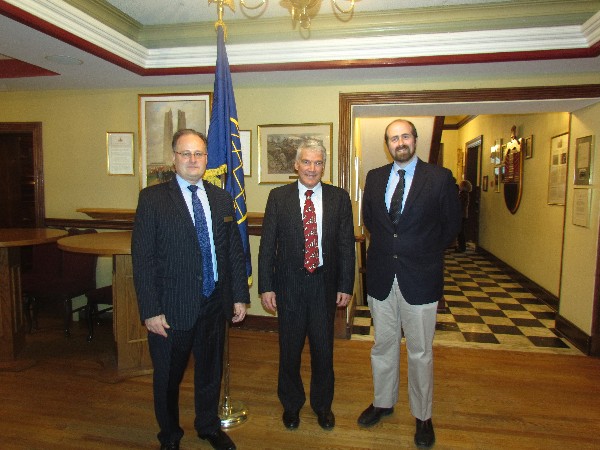 (l-r) Dave Johnson, vice president of chapter programs, visits with speakers Maj. Gen. Dave Neasmith, OMM, CD (Ret.) and Dr. Andrew Burtch, director of research, Canadian War Museum, after their discussion on the Afghanistan mission at the chapter's luncheon in January. 
