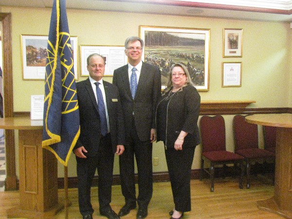 Attending the luncheon in May are Dave Johnson (l), vice president of programs with guest speaker Dr. Pierre Lavoie and Chapter President Kelly Stewart-Belisle.