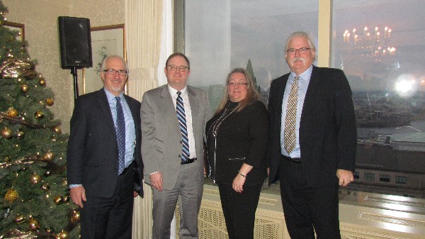 Attending the executive breakfast in December are (l-r) Maplesoft Breakfast Sponsor representative Brian Deeks; guest speaker Scott Jones; Chapter President Kelly Stewart-Belisle; and Scott Spencer, Maplesoft.