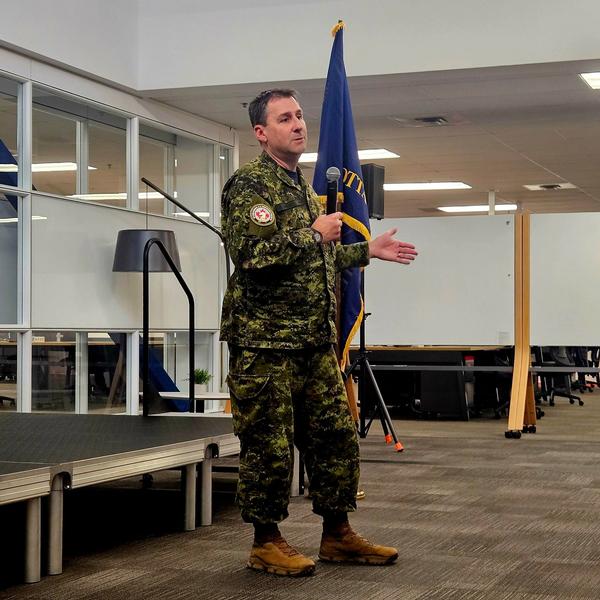 Col. Corey Crosby, chief, Joint Cyber Centre at the Department of National Defence, presents at the December luncheon.